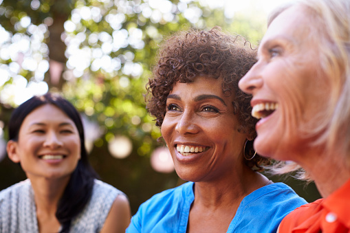 Group of ladies smiling with dental implants from Virginia Surgical Arts in Virginia Beach, VA